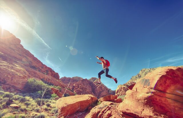man-person-jumping-desert