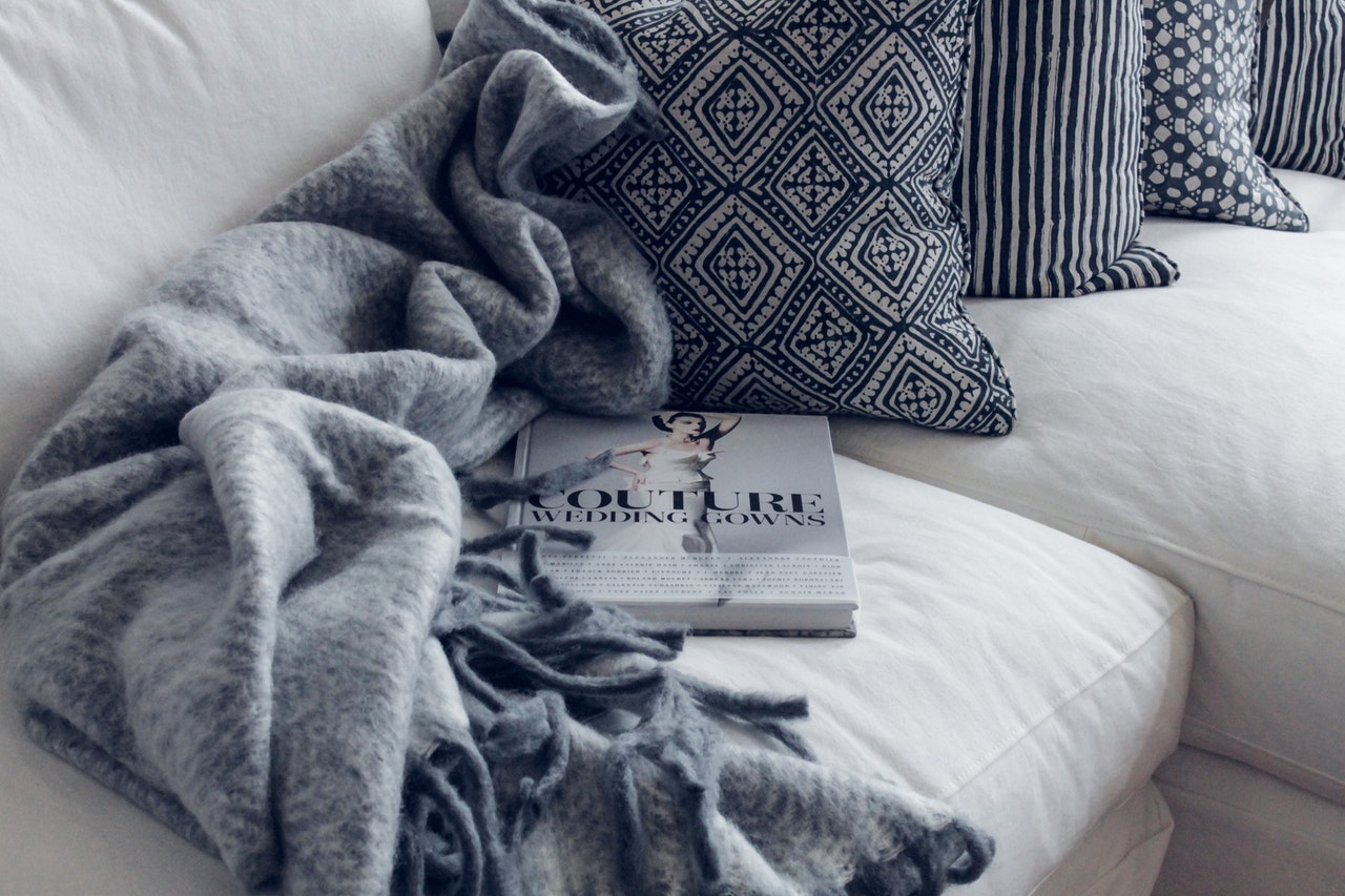 couture-book-on-sofa-1421176.jpg
