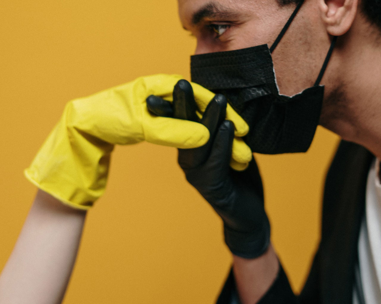 man-in-face-mask-kissing-hand-3951883.jpg